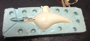 This is what the bait looks like before it's de-molded, at this point it must be cleaned,sanded and primed
