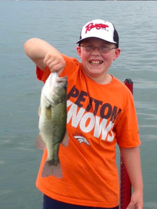 Tyler Boots holding is nice largemouth bass caught on Cave Run Lake last week. (photo submitted)