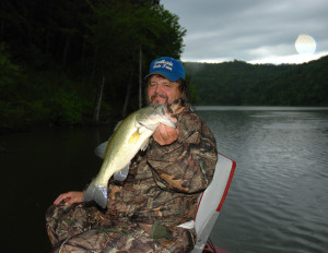 Author Chris Erwin holding one of the fish caught on Cave Run Lake right before the holiday weekend rains set in. (Photo by Scott Erwin)