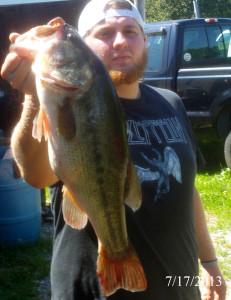 Brandon Thompson holding a 5-pound Largemouth Bass caught on Laurel River Lake July 17. (photo submitted)