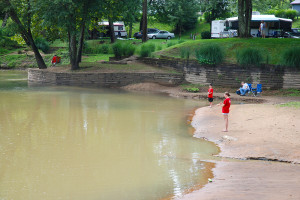 Campers take advantage of the calm water below the falls