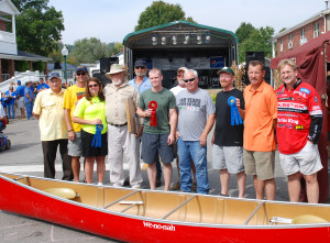 Winners of the canoe race Aaron Collier, Craig Adkins, Phillip Abbott, Ed Abbott, Tim Clay, Jim White, Anne Parrott and Alan Parrott, along with Soc Clay, Tom Clay Sam Piatt (Photo by Chris Erwin)