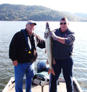 Robbie Jordan and Donnie Ingles are pictured here holding a 44 inch muskie caught on Cave Run Lake just before the lake closed. (photo submitted).