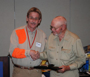 Art Schultise founder and CEO of Action-Certified Shiner Lures (AC Shiner), is presented with KOPA's highest award by President Tom Clay during its annual meeting last week at The Morehead Convention Center. (Photo by Chris Erwin)
