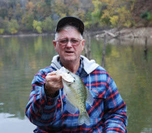 Hershell Crum holding one of the many crappie caught while fishing Cave Run Lake this October. (Photo by Chris Erwin)