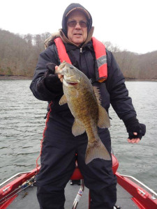 Bill Malloy holding a 20 inch smallmouth caught on Dale Hollow Lake Dec. 7. (Photo submitted)