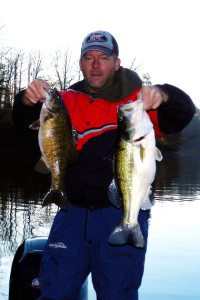 Scott Doan holding a 6.5 pound Largemouth Bass and a 3 pound 10 oz Smallmouth Bass caught on Laurel River Lake Jan.12, 2014. (Photo submitted).