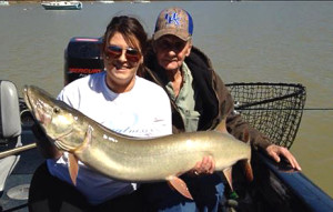 Megan Pelfrey holding a 42” muskie caught on Cave Run Lake. (Photo submitted)