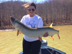 Megan Pelfrey holding the 42' muskie she caught on Cave Run Lake. (Photo submitted)