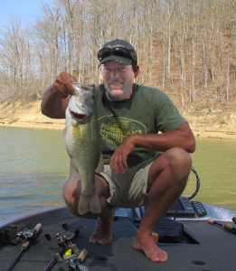 Scott Doan holding a five pound largemouth bass caught on Cave Run Lake April 19. (photo submitted)