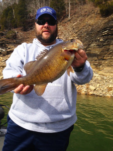 Dustin Rose holding a nice smallmouth caught on Lake Cumberland last week. (photo submitted)