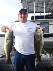 Frank Batten holding a pair of largemouth bass caught on Laurel River Lake April 26. (Photo submitted)