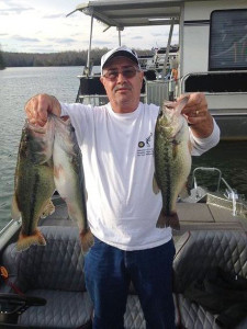 Frank Batten holds three largemouth bass as he continues to catch bass at Laurel River Lake. (photo submitted) 