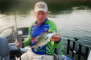 David Jones, a professional crappie guide on Green River Lake, holding a typical fish one could expect to catch while fishing with him. (Photo by Chris Erwin)
