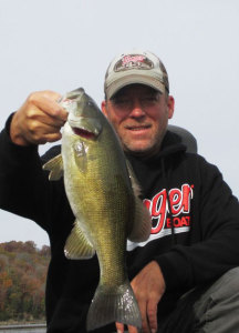 Scott Doan holding a nice smallmouth caught on Dale Hollow Lake last week using a shakey-head jig. (photo submitted)