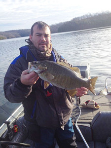 Chad Batten displaying a smallmouth caught on Laurel River Lake Jan 7. Brothers Chad and Frank Batten managed to boat a 6.2 pound and 5.9 pound smallmouth while fishing deep and using jigging spoons (photo submitted)