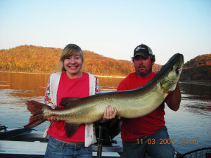 Sarah Terry and step-father Scott Salchli holding the Kentucky state record musky caught by Terry on Cave Run Lake in 2008. The fish was hooked on a double Cow-girl spinnerbait, and weighed in at 47 pounds. (photo submitted)