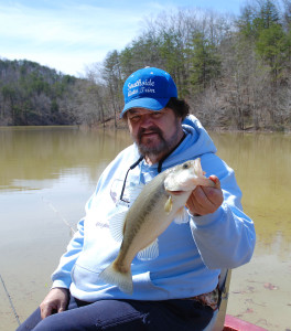 Author Chris Erwin holding the first fish of the day caught on a lipless crankbait at Yatesville Lake. (Photo by Scott Erwin)