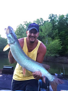 Chris Leffer holding a 40-inch Muskie caught in early May on Cave Run Lake. (photo submitted)