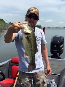 Roger Coleman caught this good looking bass from Cedar Creek Lake in late June. He and Scott Doan managed to catch 20 bass using plastic worms and jerk baits. (photo submitted