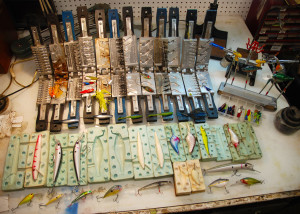 A small portion of author Chris Erwin’s lure crafting molds and end products. These will give you a hint at what you can do if you use the off-season to make your own lures for the up-coming fishing season. (Photo by Chris Erwin)