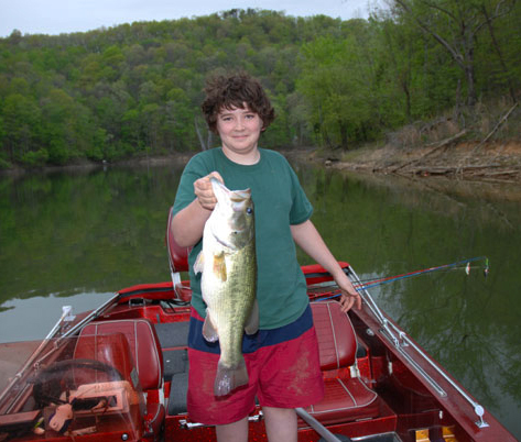 Author Chris Erwin's grandson Tyler Thomas in 2008 when he decided he didn't need to use live bait any longer. Fishing is the connection that has kept our family close. (photo by Chris Erwin) 