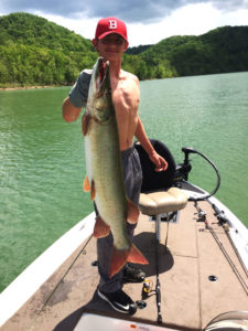Dylan Gifford holding the 42-inch Muskie he caught at Cave Run Lake on 6 pound test line (photo submitted) 